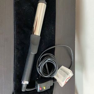 GHD curve curling iron.
